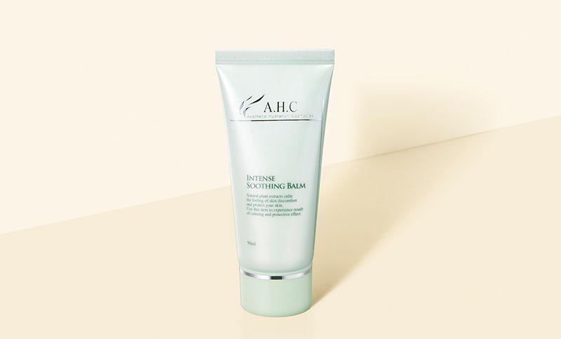 AHC Intense Soothing Balm tube on a plain background to highlight calming skincare properties.